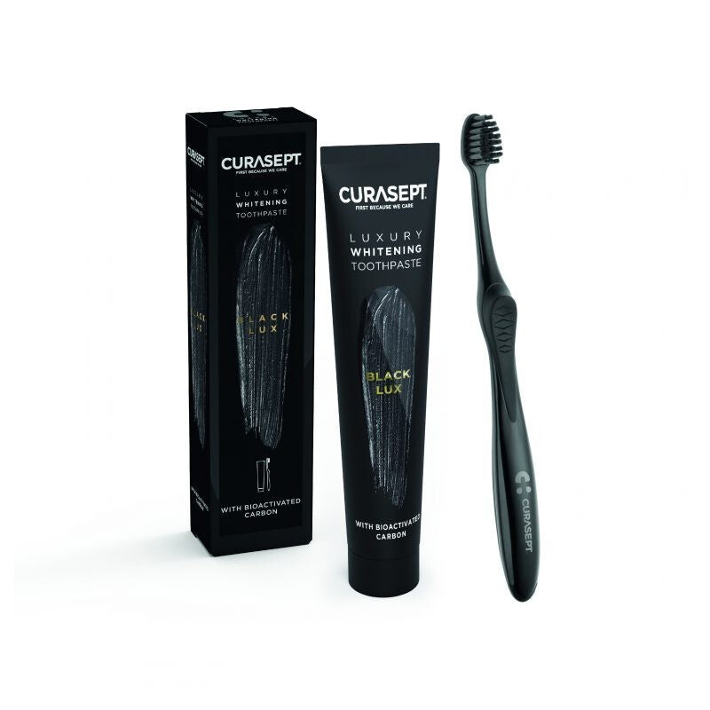Curasept Pack Luxury Whitening Dentifrice Black 75 ml + Brosse à dents Curasept Pack Luxury Whitening Dentifrice Black 75 ml + Brosse à dents